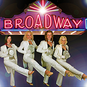 Broadway dancers in a kick line